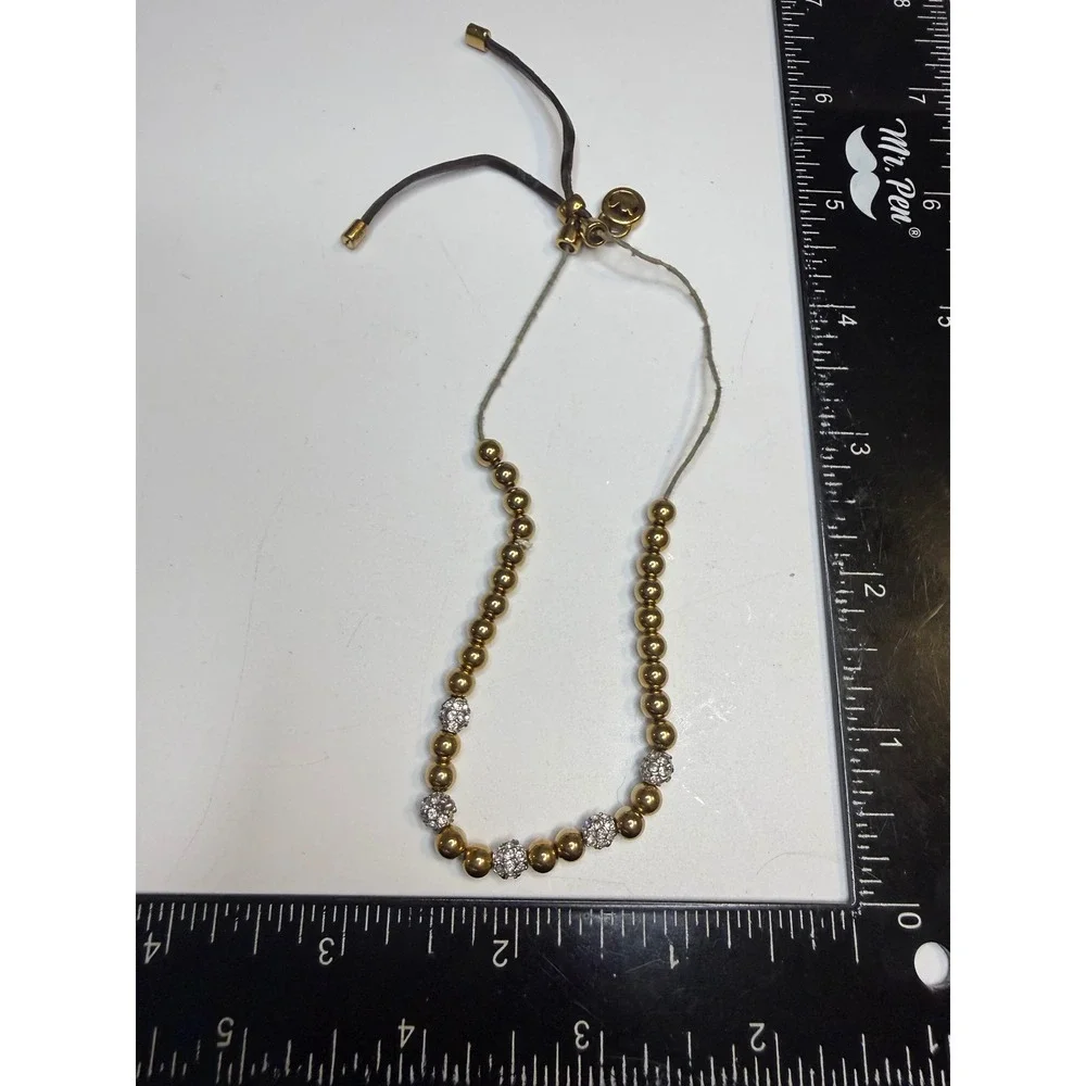 Michael Kors Gold Tone Pave Crystal Bead Adjustable Slider Bracelet MK Logo